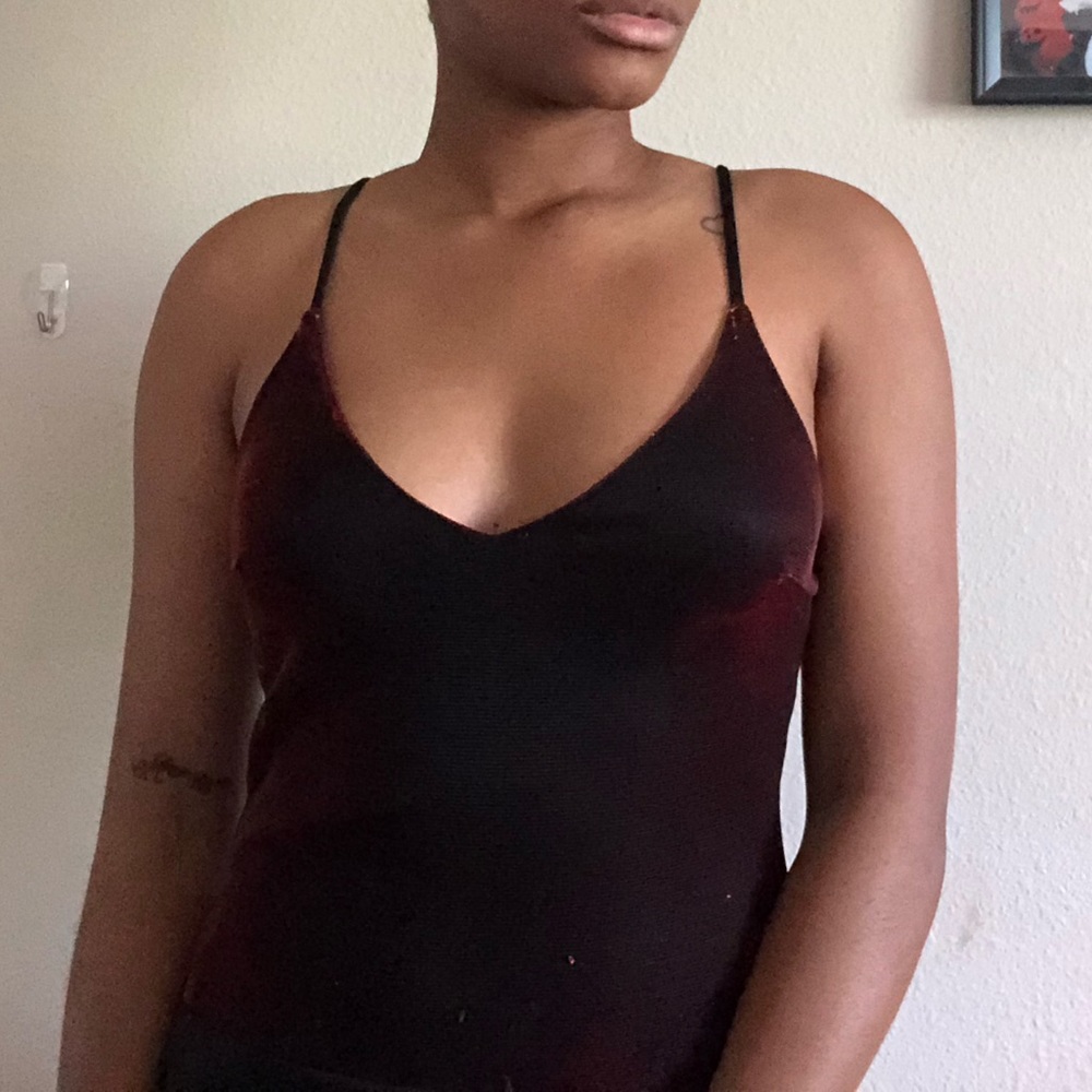 Thin strapped red chrome bodysuit